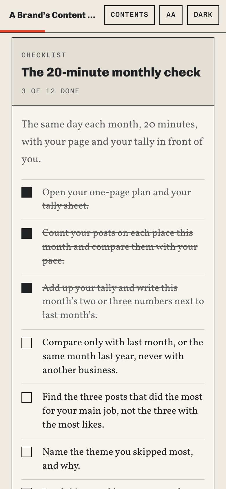 The 20-minute monthly check in the web book, on a phone, with three items ticked.